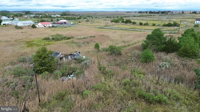 a view of a lake with green space