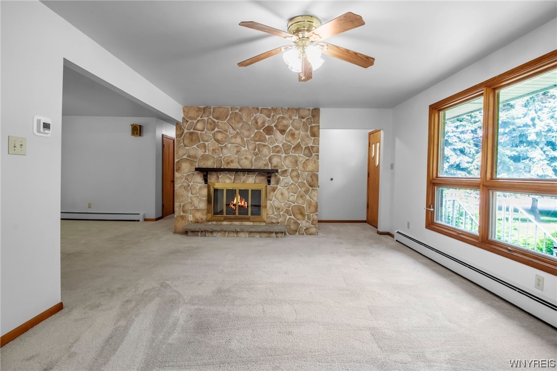 1022 Ridge Road Lewiston, NY 14092 - Photo 22 of 48 Custom stone wall with gas fireplace