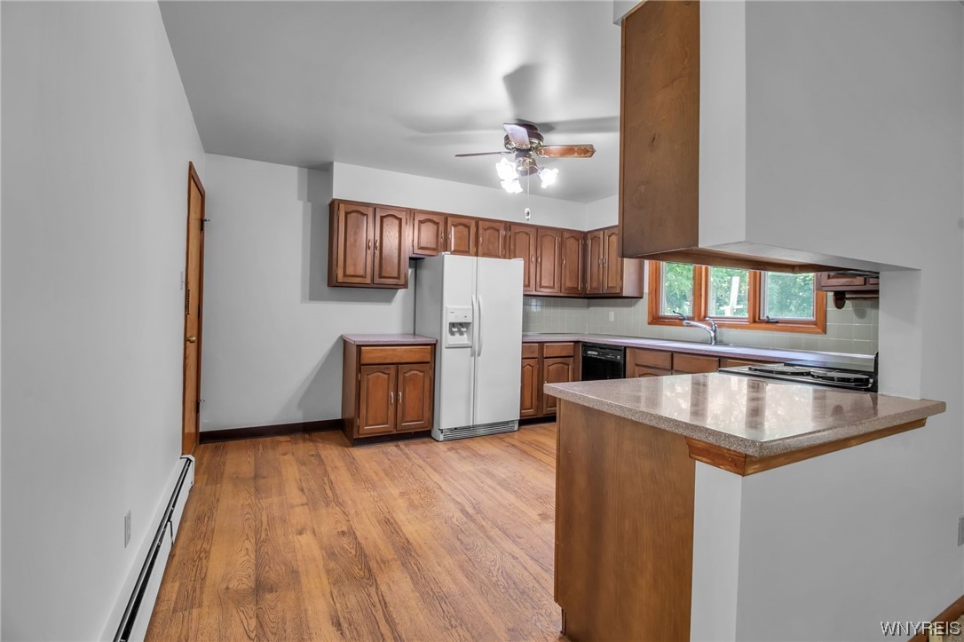 1022 Ridge Road Lewiston, NY 14092 - Photo 29 of 48 Dining room opens up to the kitchen