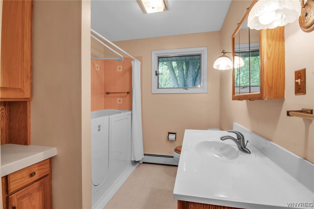 1022 Ridge Road Lewiston, NY 14092 - Photo 36 of 48 Walk-in tub and custom built-in storage