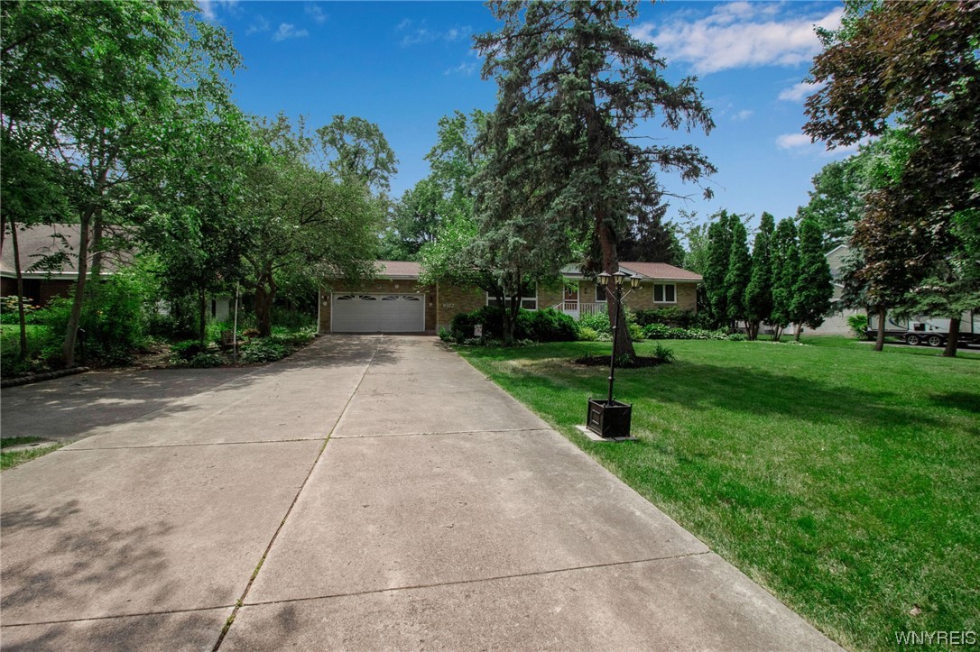 1022 Ridge Road Lewiston, NY 14092 - Photo 5 of 48 Concrete driveway with turn-around area