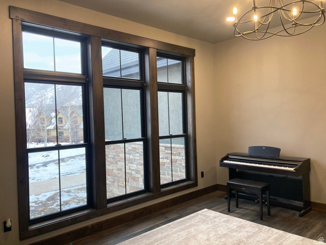 259 Meadow Drive Springville, UT 84663 - Photo 24 of 62 Sitting room featuring suspended lighting and dark wood-style floors