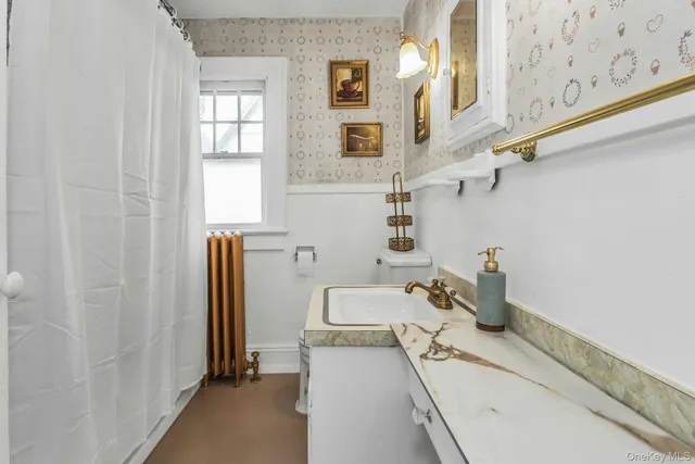a kitchen with stainless steel appliances granite countertop a stove and a sink with dishwasher