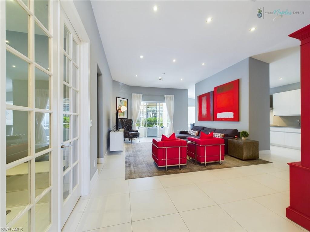 1952 Timarron Way Naples, FL 34109 - Photo 18 of 46 a living room with furniture