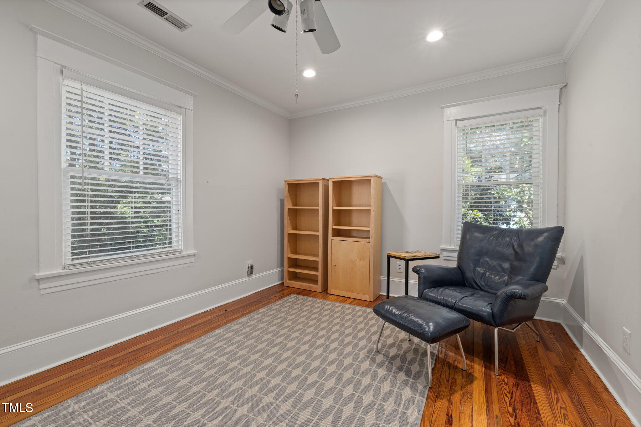 1803 White Oak Road Raleigh, NC 27608 - Photo 19 of 33 a bedroom with furniture and a window