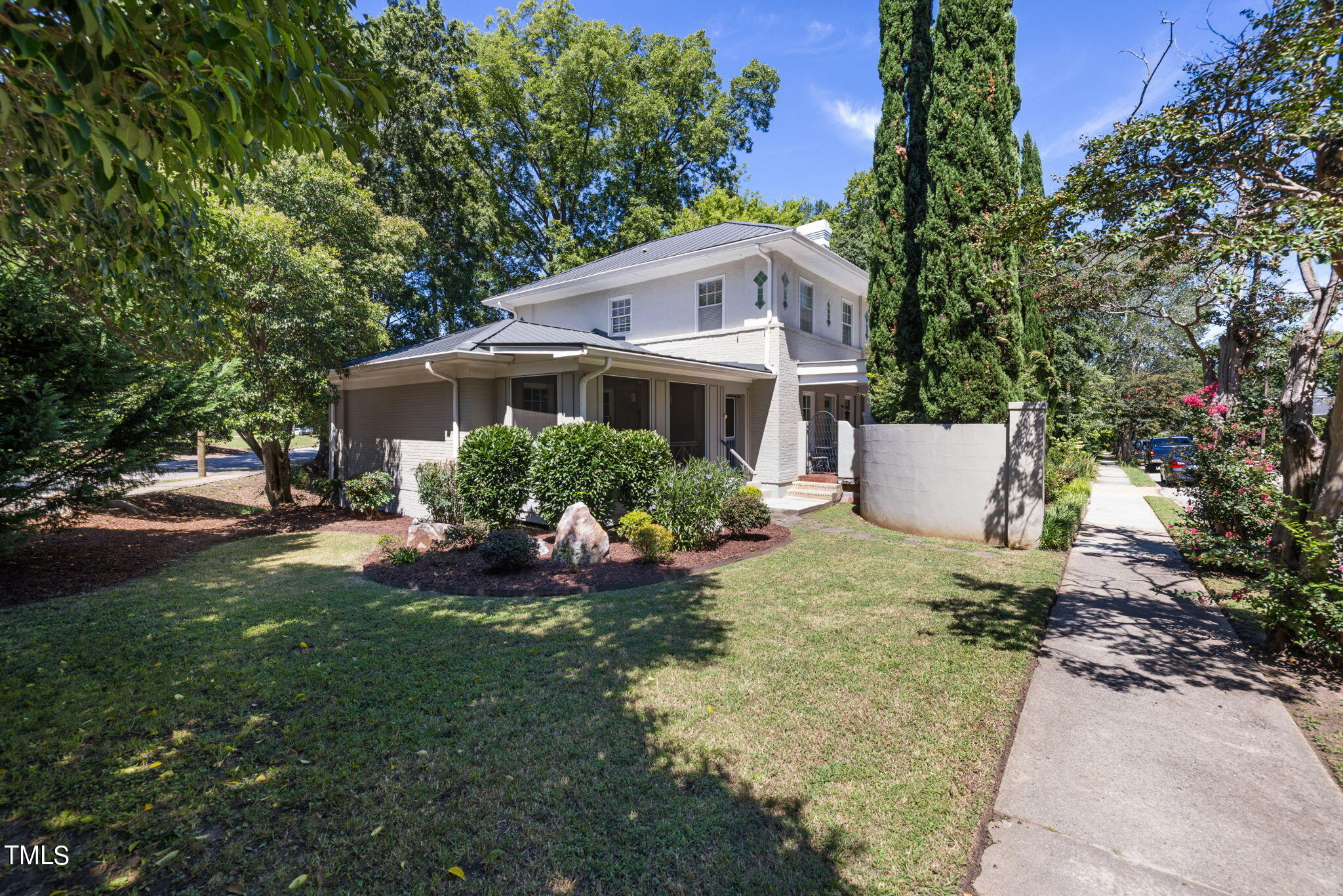 1803 White Oak Road Raleigh, NC 27608 - Photo 24 of 33 a view of a house with backyard and sitting area