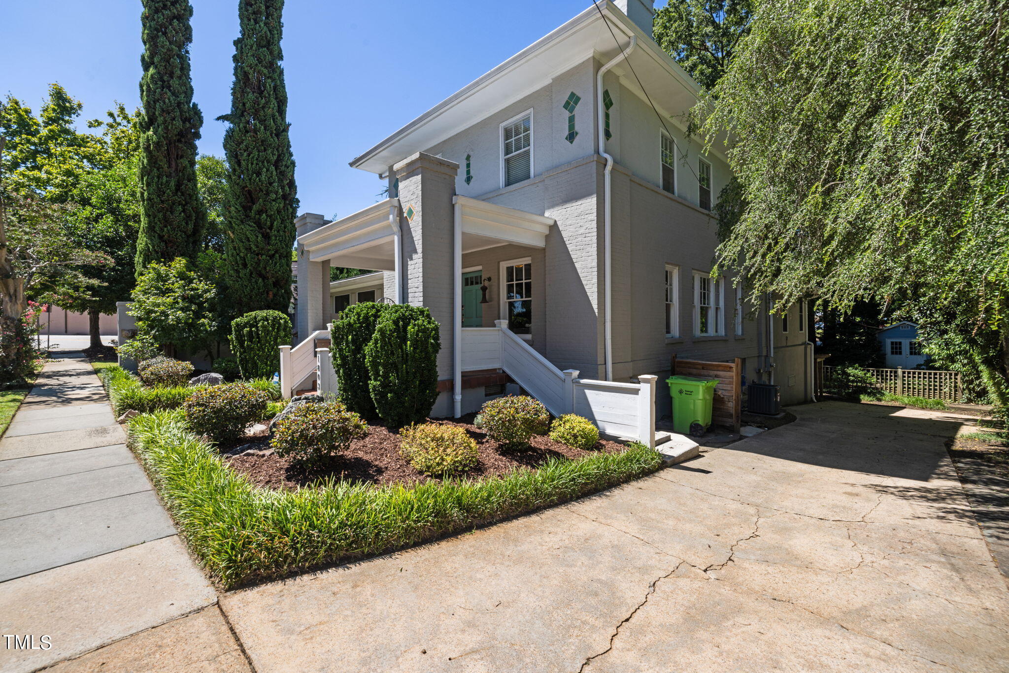1803 White Oak Road Raleigh, NC 27608 - Photo 25 of 33 a front view of a house with a yard