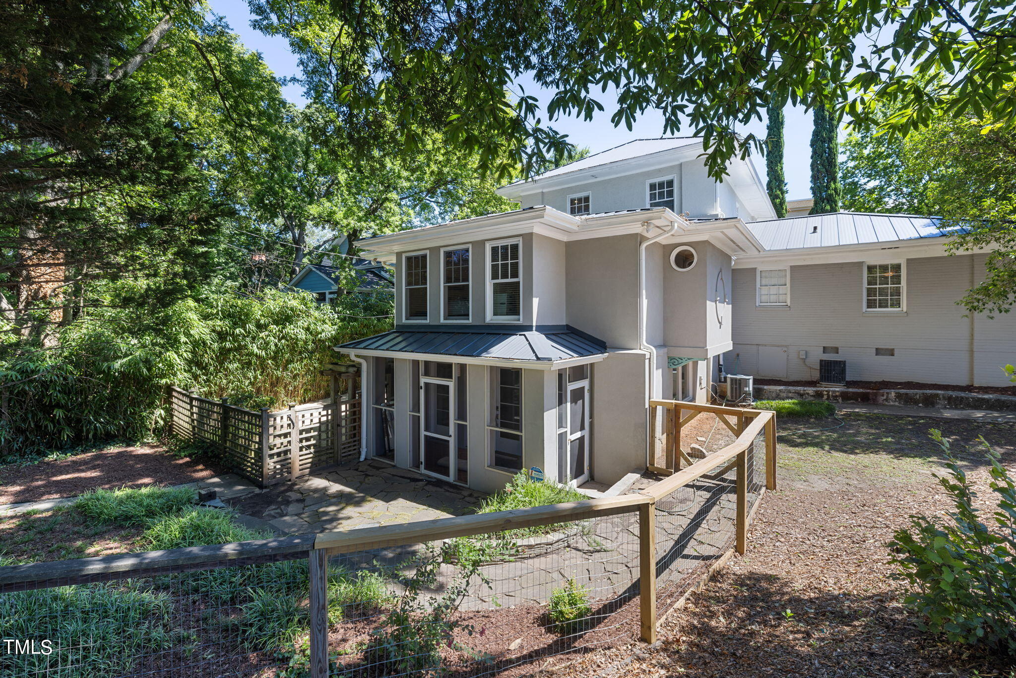 1803 White Oak Road Raleigh, NC 27608 - Photo 27 of 33 a front view of a house with garden
