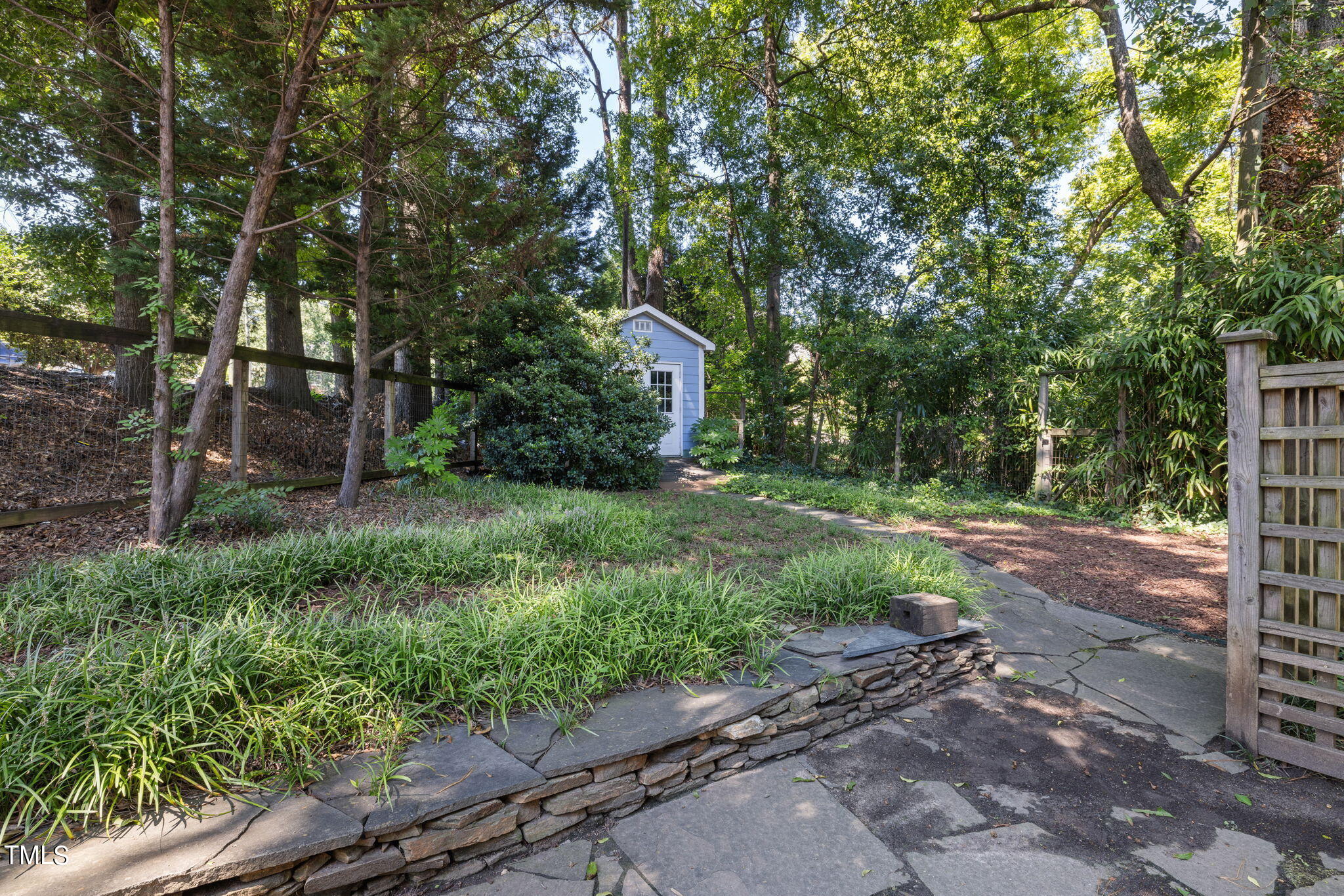 1803 White Oak Road Raleigh, NC 27608 - Photo 28 of 33 a view of a house with a yard and tree s