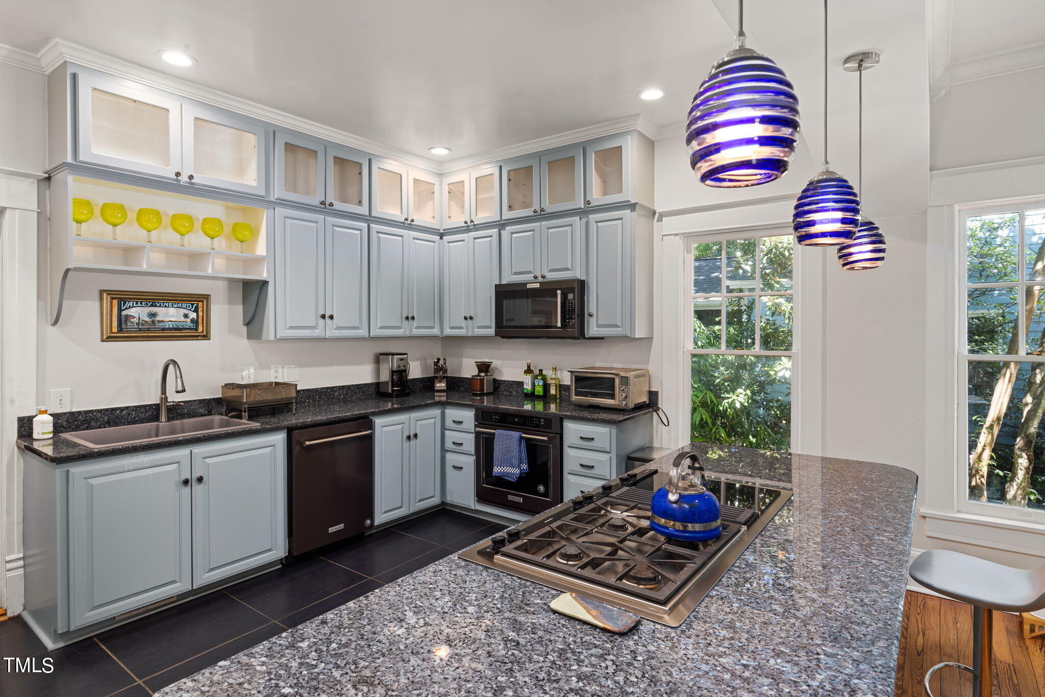 1803 White Oak Road Raleigh, NC 27608 - Photo 8 of 33 a kitchen with stainless steel appliances granite countertop a stove a sink dishwasher and a stove