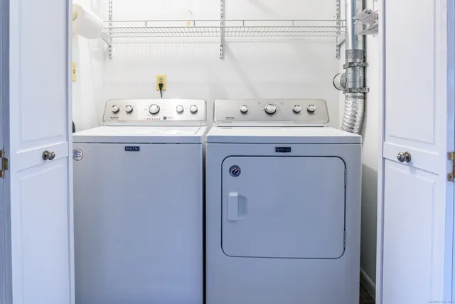 a utility room with dryer and washer