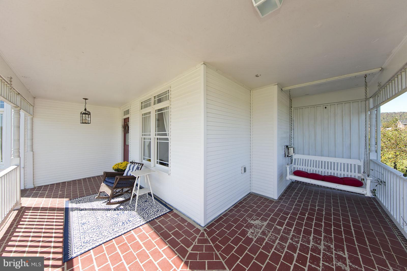 195 Reunion Corner Road Gerrardstown, WV 25420 - Photo 25 of 30 Wrap around front porch.