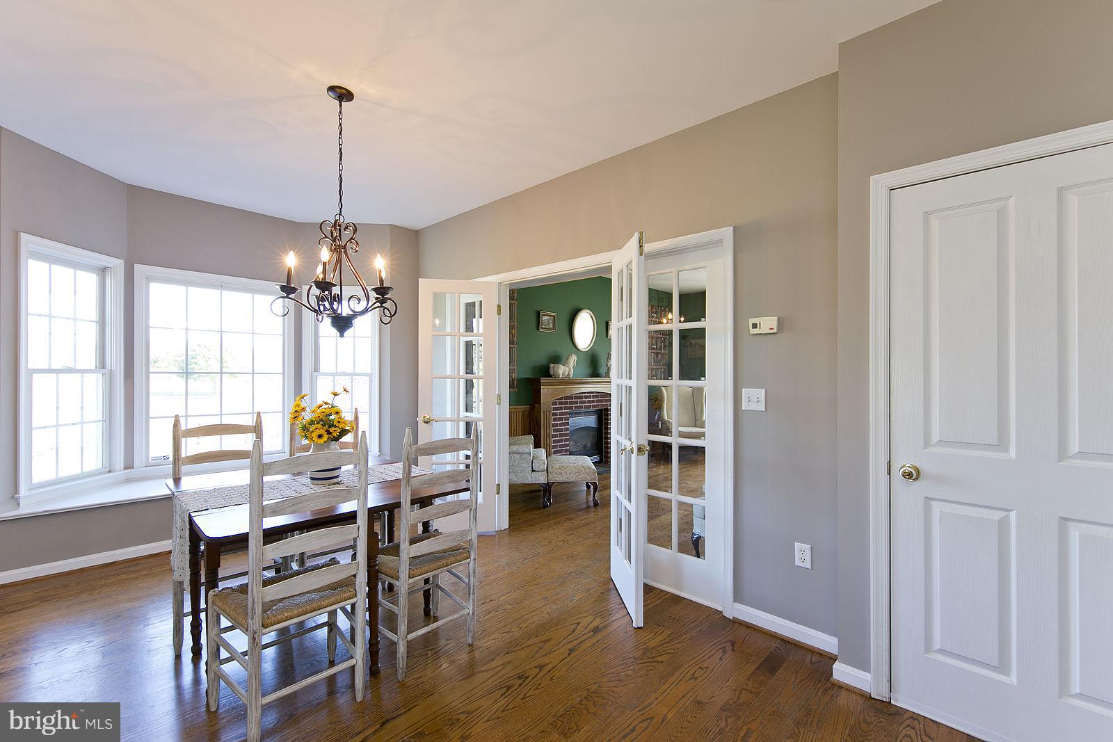 195 Reunion Corner Road Gerrardstown, WV 25420 - Photo 10 of 30 Bright dinning room w hardwood floors n bay window