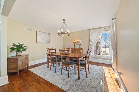 a spacious bedroom with a bed and a couch