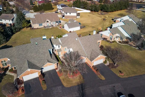 a living room with fireplace furniture and a flat screen tv