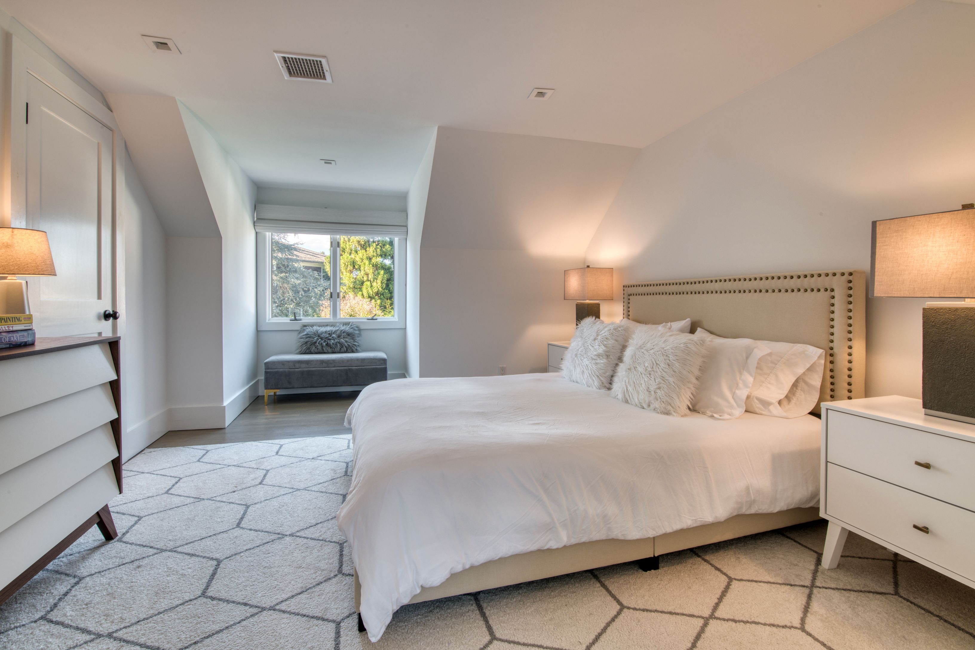 225 Oak Street Bridgehampton, NY 11932 - Photo 14 of 26 a bedroom with a bed and a view of bedroom