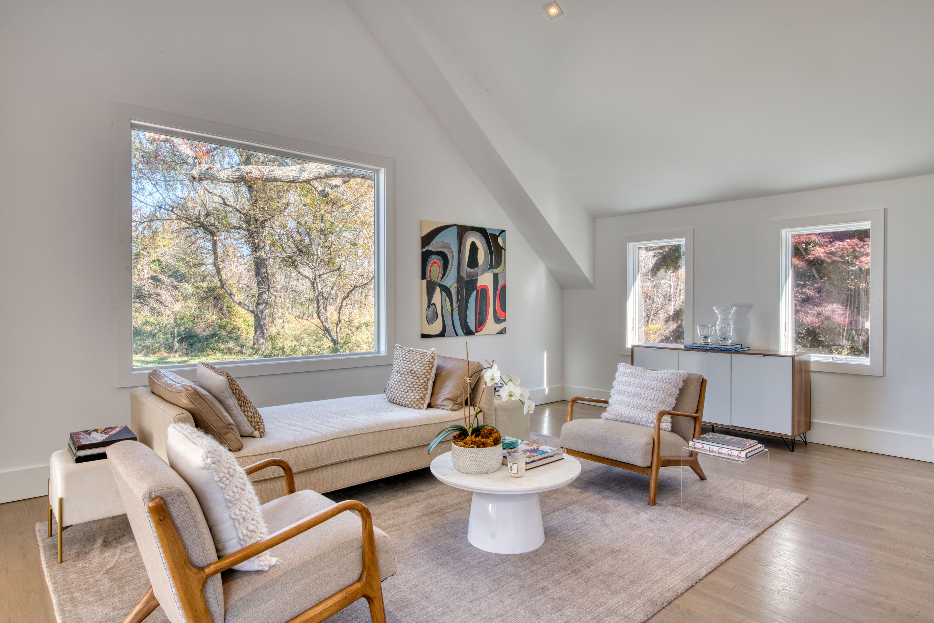 225 Oak Street Bridgehampton, NY 11932 - Photo 5 of 26 a living room with furniture and a large window