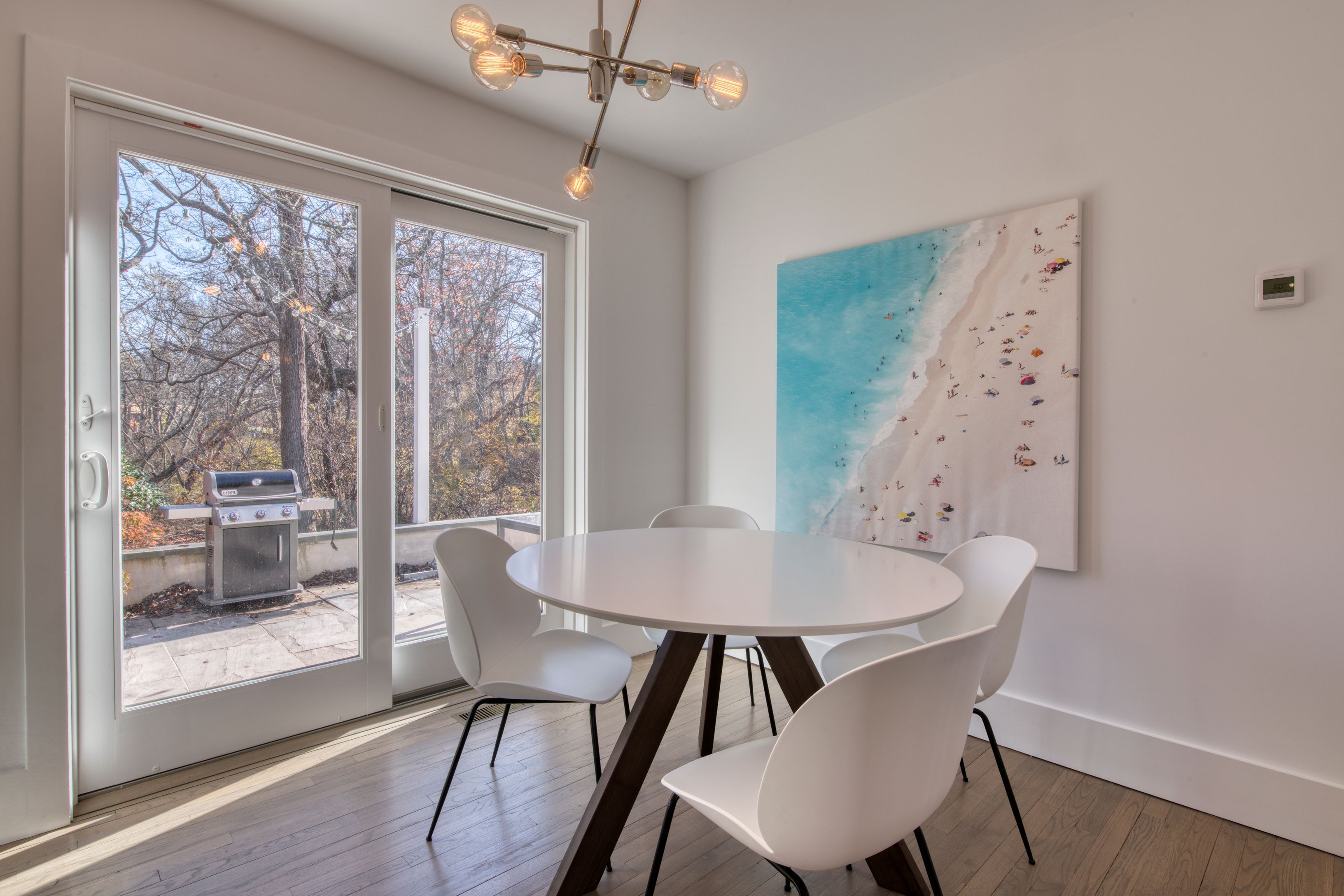 225 Oak Street Bridgehampton, NY 11932 - Photo 10 of 26 a view of a dining room with furniture window and wooden floor