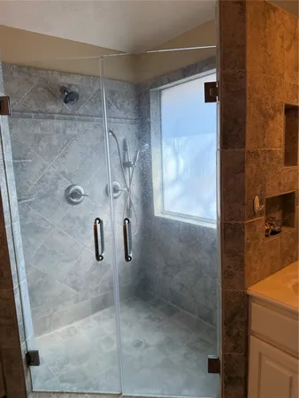 a view of an empty walk in closet