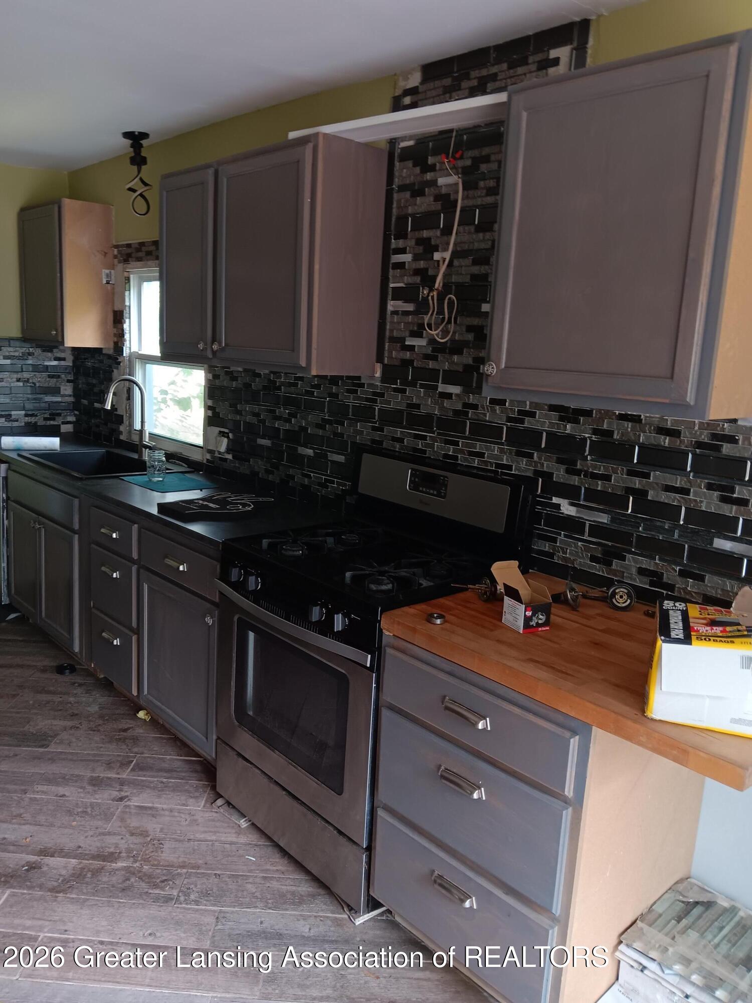 1901 West Holmes Road Lansing, MI 48910 - Photo 4 of 9 20260720_145921