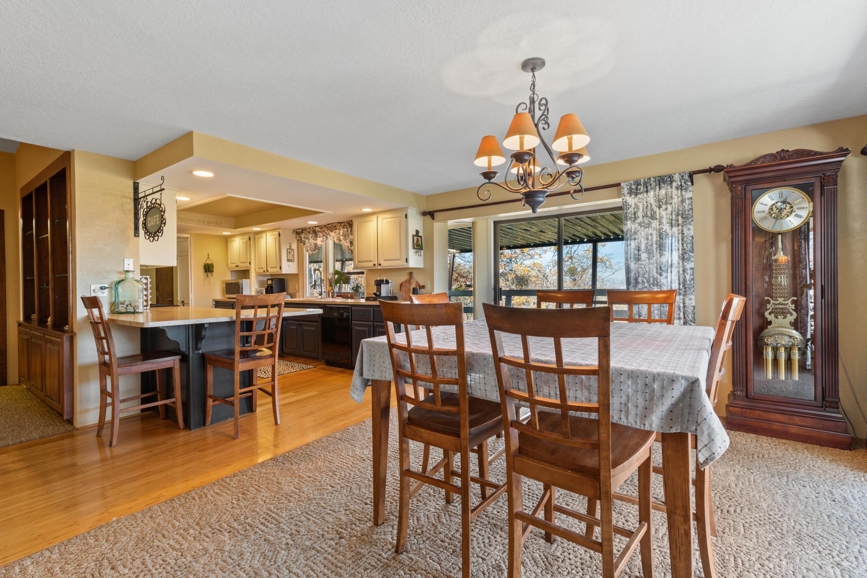 4351 Pioneer Road Medford, OR 97501 - Photo 25 of 55 Formal Dining Room area with access to Upper Level Deck with North and East Valley Views