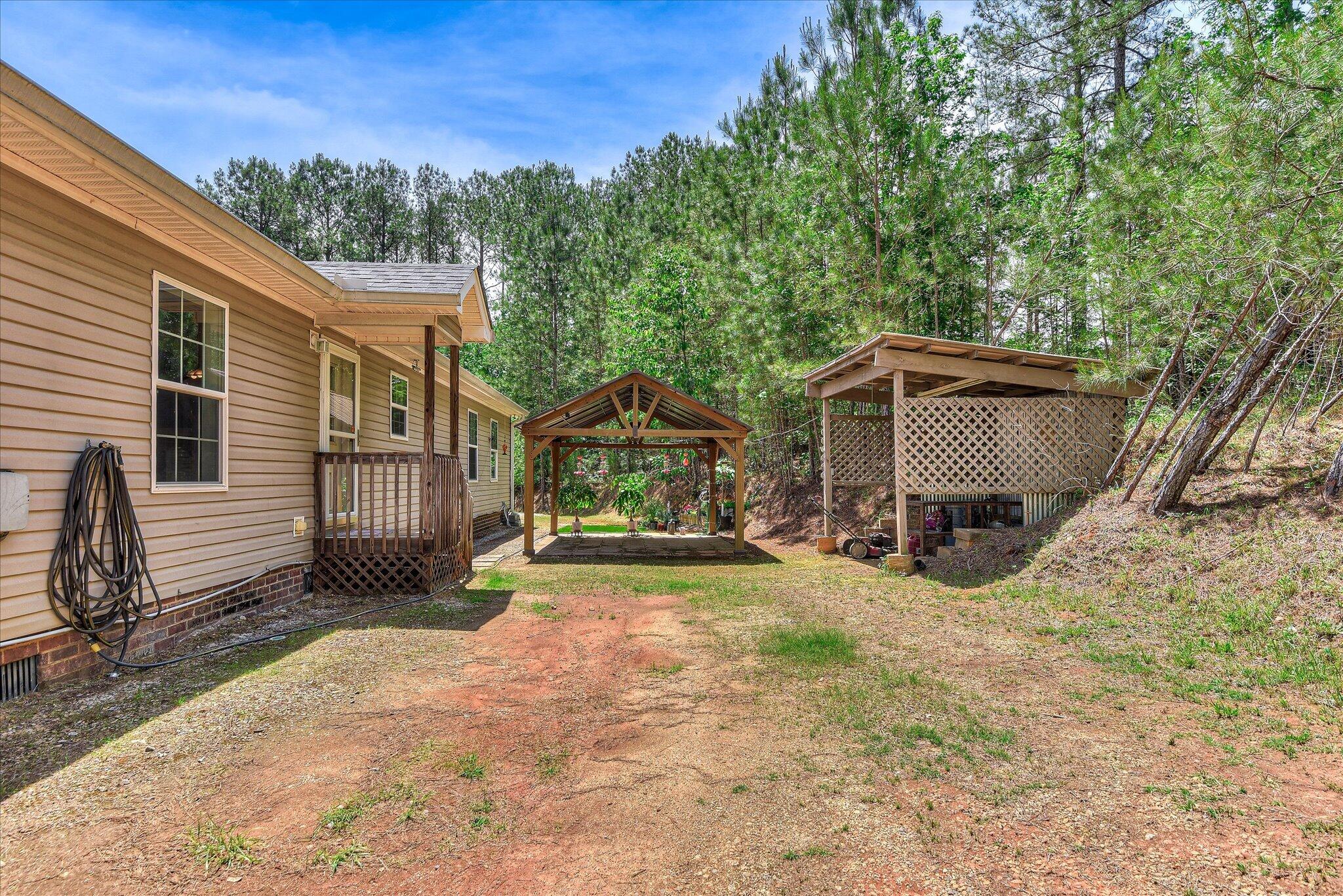 1405 Garrett Road Clarks Hill, SC 29821 - Photo 43 of 51 a view of a house with a yard