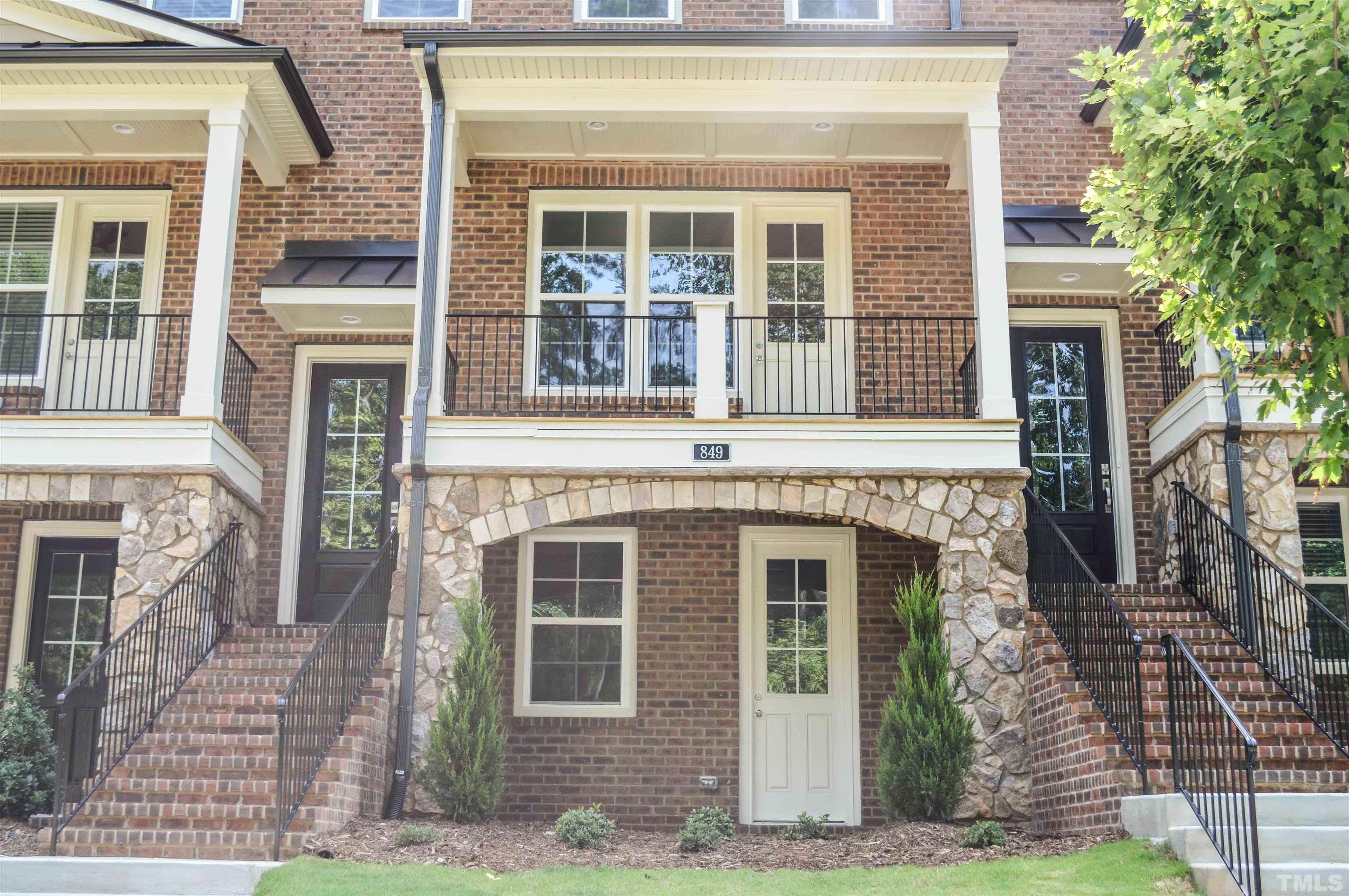 front view of a brick house with a window