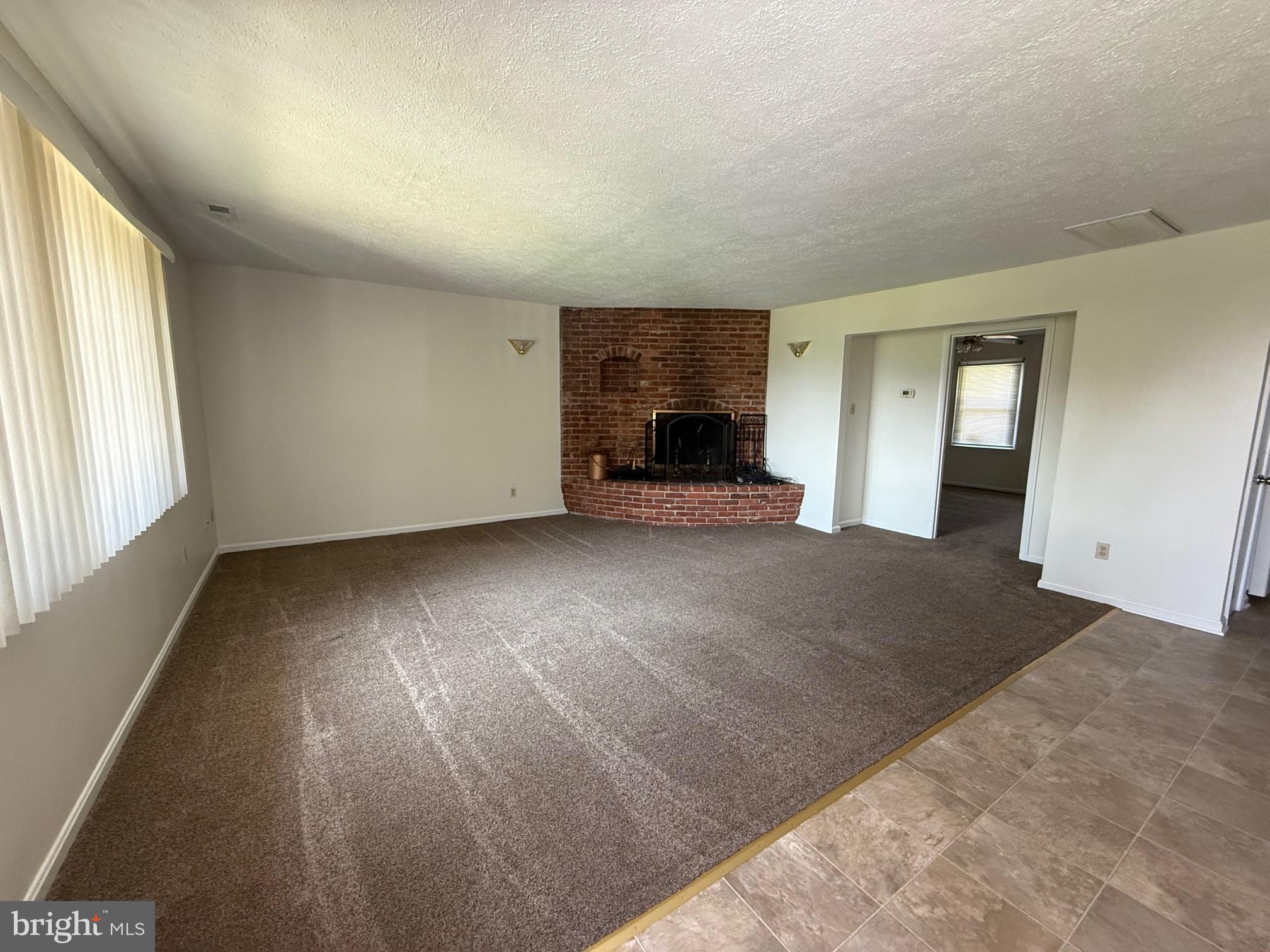 46420 Rue Purchase Road, Unit 4 Lexington Park, MD 20653 - Photo 6 of 21 Living room with fireplace