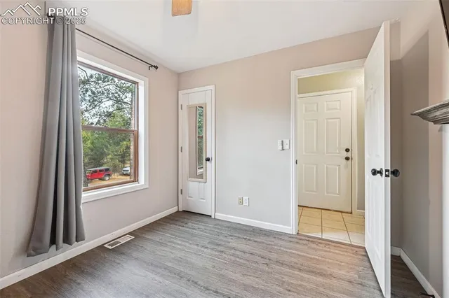 a bathroom with a sink a mirror and a toilet