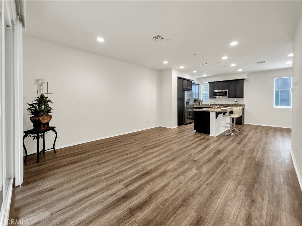 7418 Solstice Place Rancho Cucamonga, CA 91739 - Photo 4 of 18 a view of kitchen with sink microwave and stove