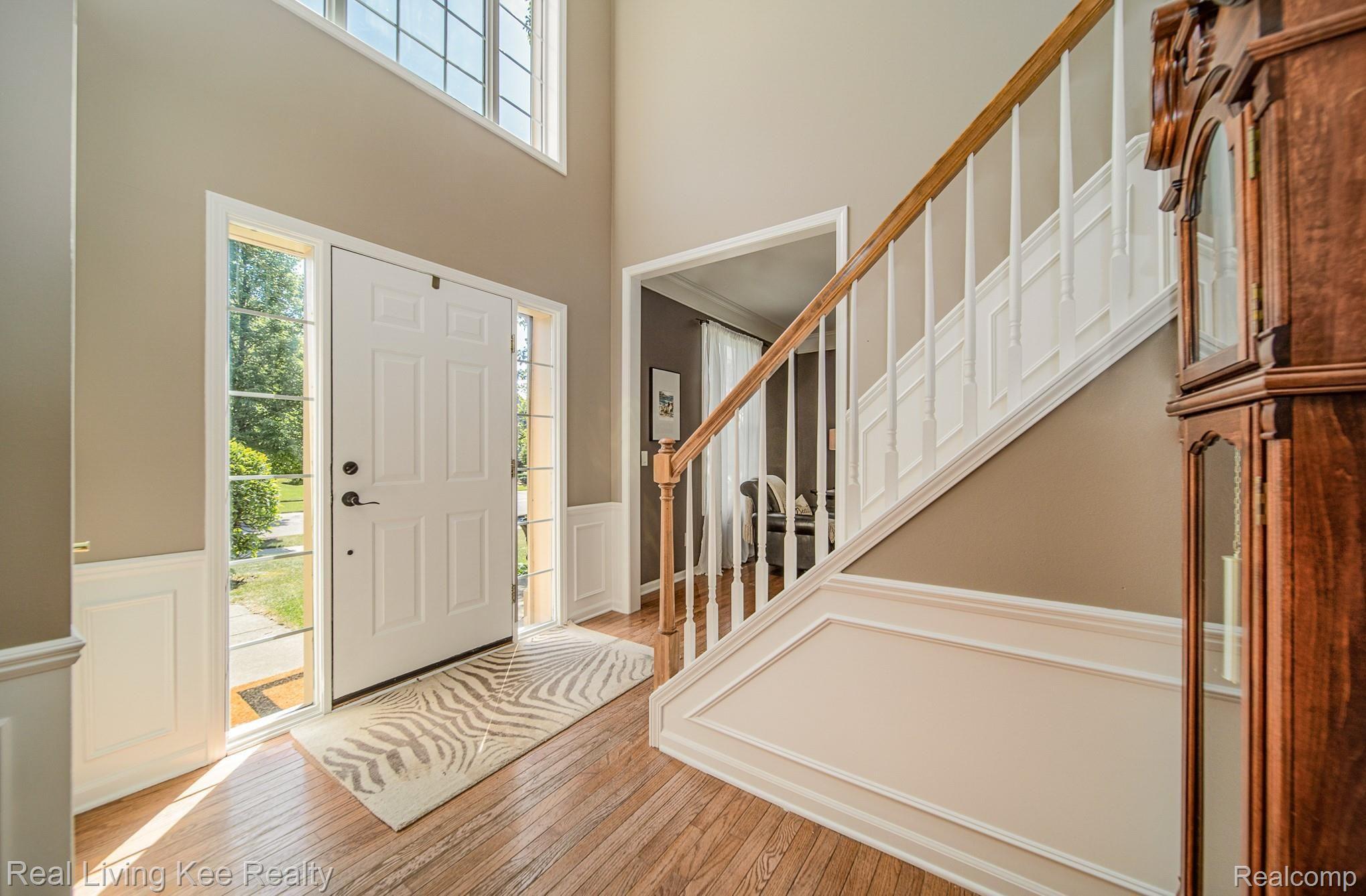 Hardwood Floors in 2 Story Foyer and Hallway