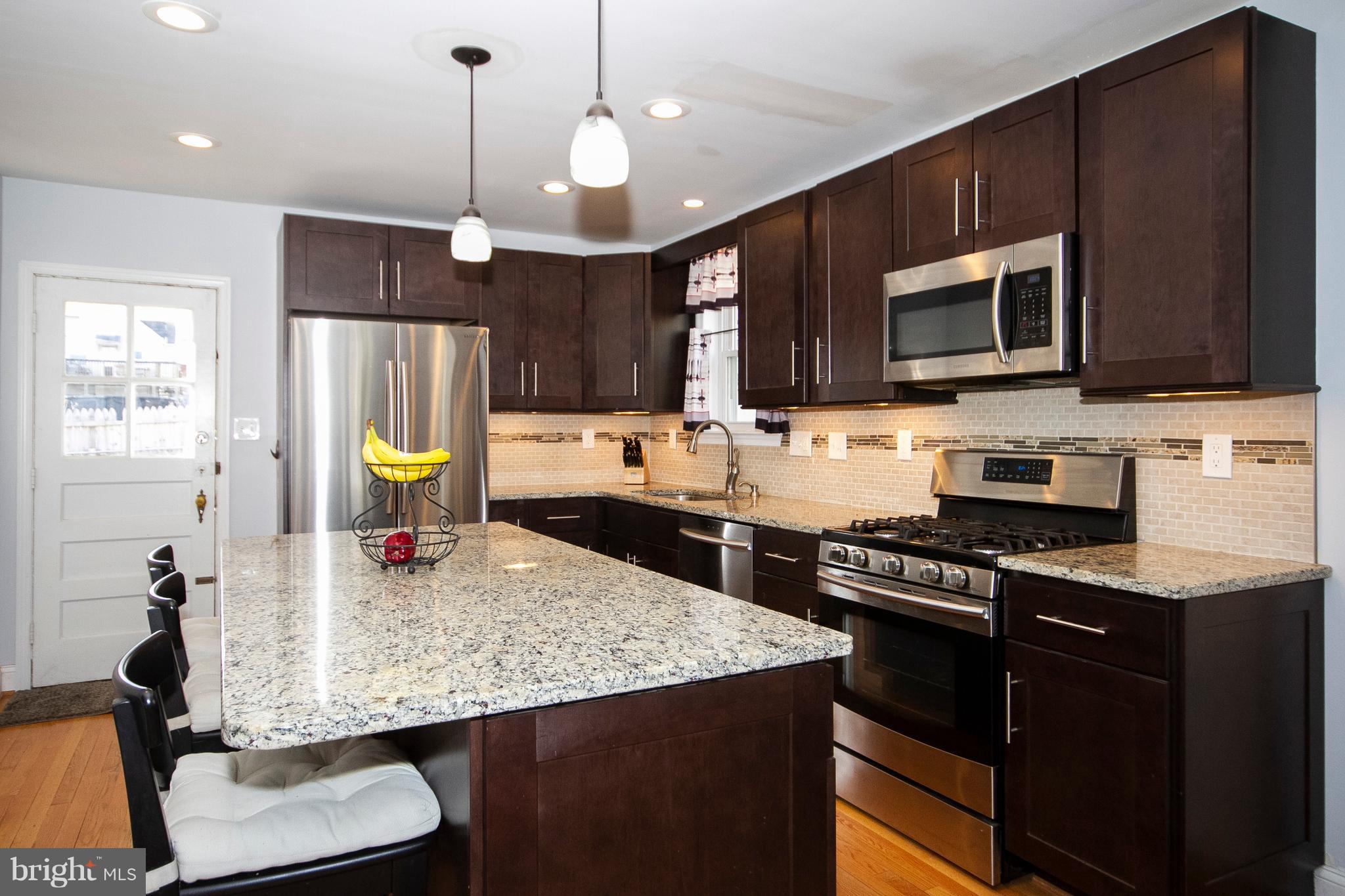 3005 Parktowne Road Baltimore, MD 21234 - Photo 3 of 25 Pendant lighting Large Island Wood Floors