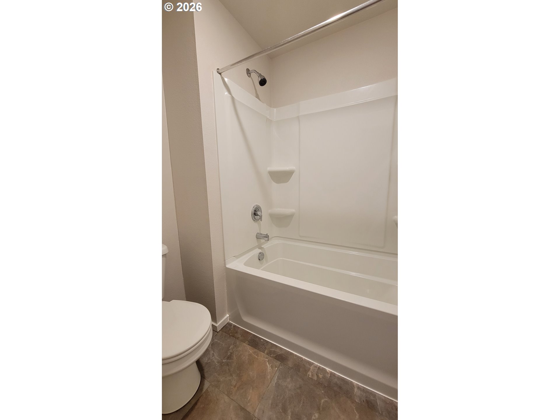 2960 V Street Springfield, OR 97477 - Photo 18 of 27 a bathroom with a toilet and a bathtub