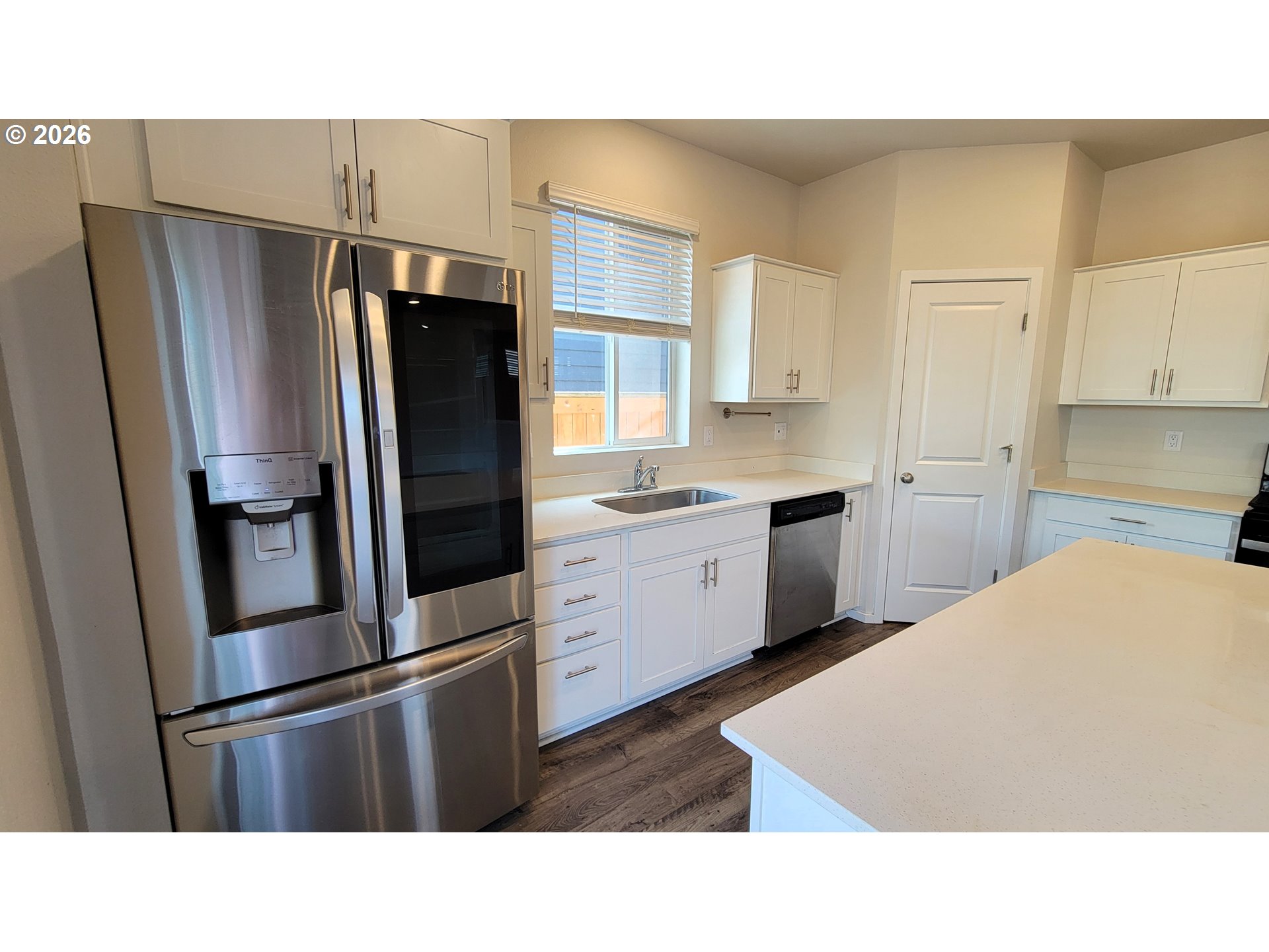 2960 V Street Springfield, OR 97477 - Photo 6 of 27 a kitchen with a refrigerator stainless steel appliances