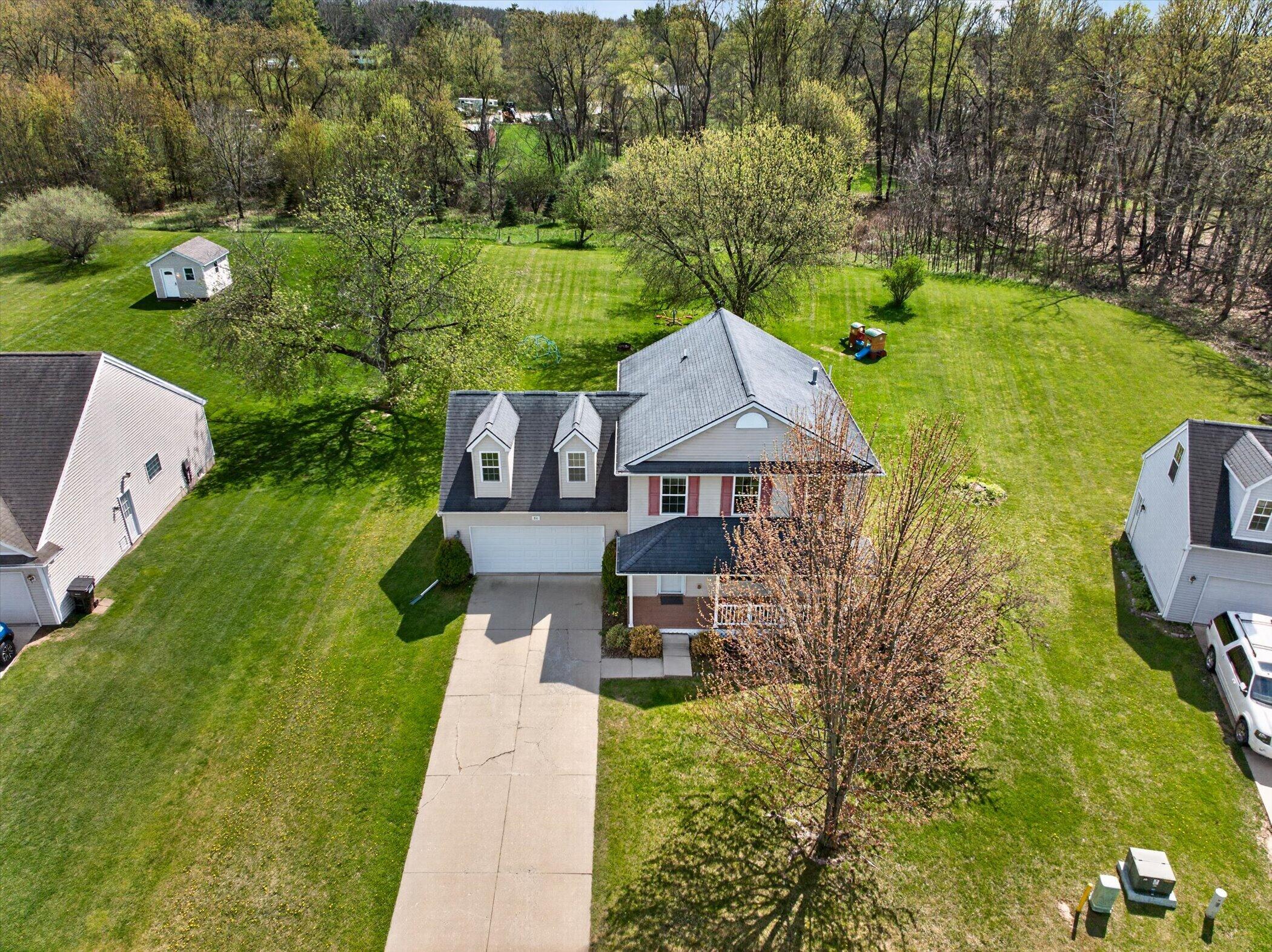 86 Fox Meadows Court Howell, MI 48843 - Photo 4 of 37 35-86-Fox-Meadows-Ct-WindowStill-Real-Es