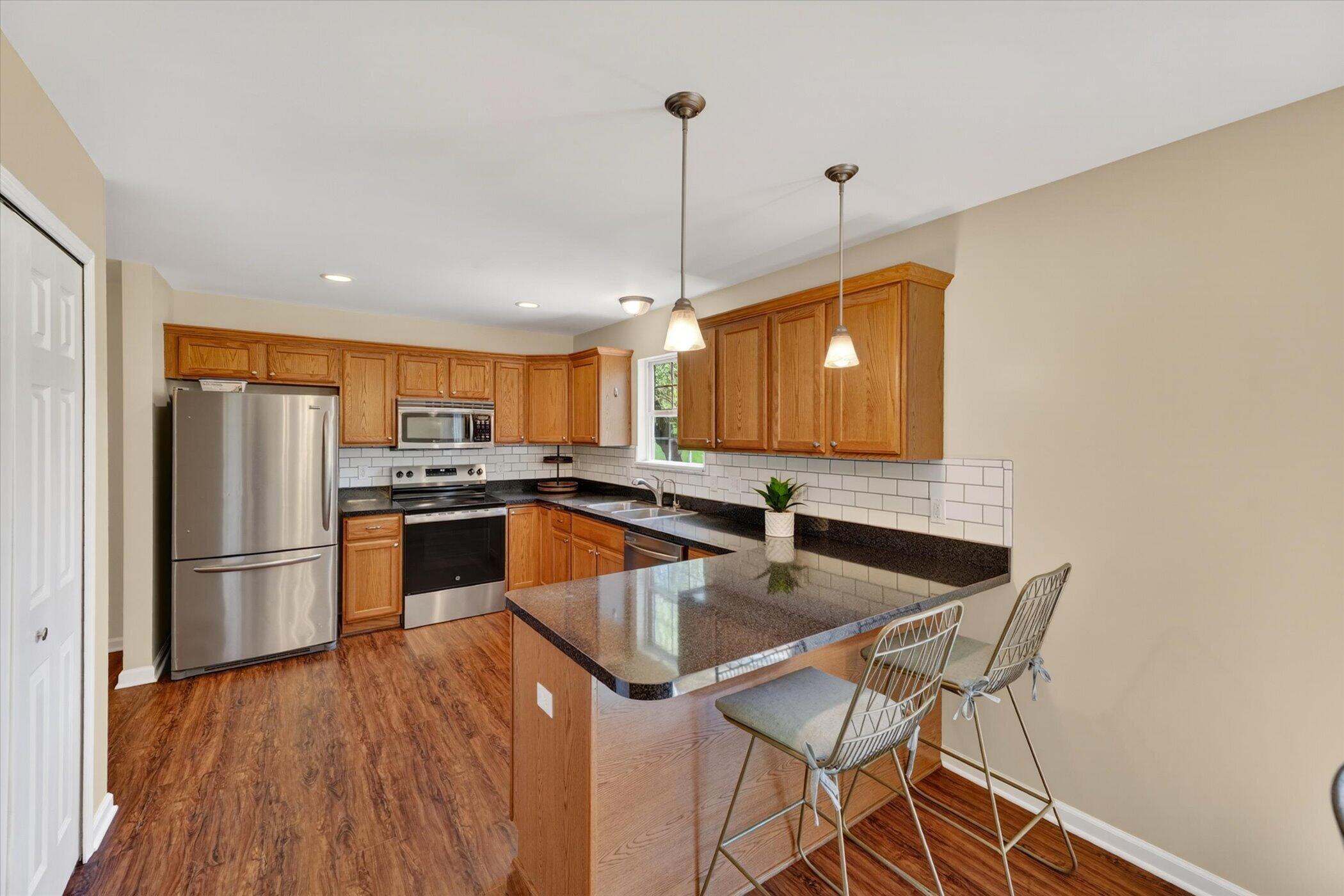 86 Fox Meadows Court Howell, MI 48843 - Photo 6 of 37 10-86-Fox-Meadows-Ct-WindowStill-Real-Es