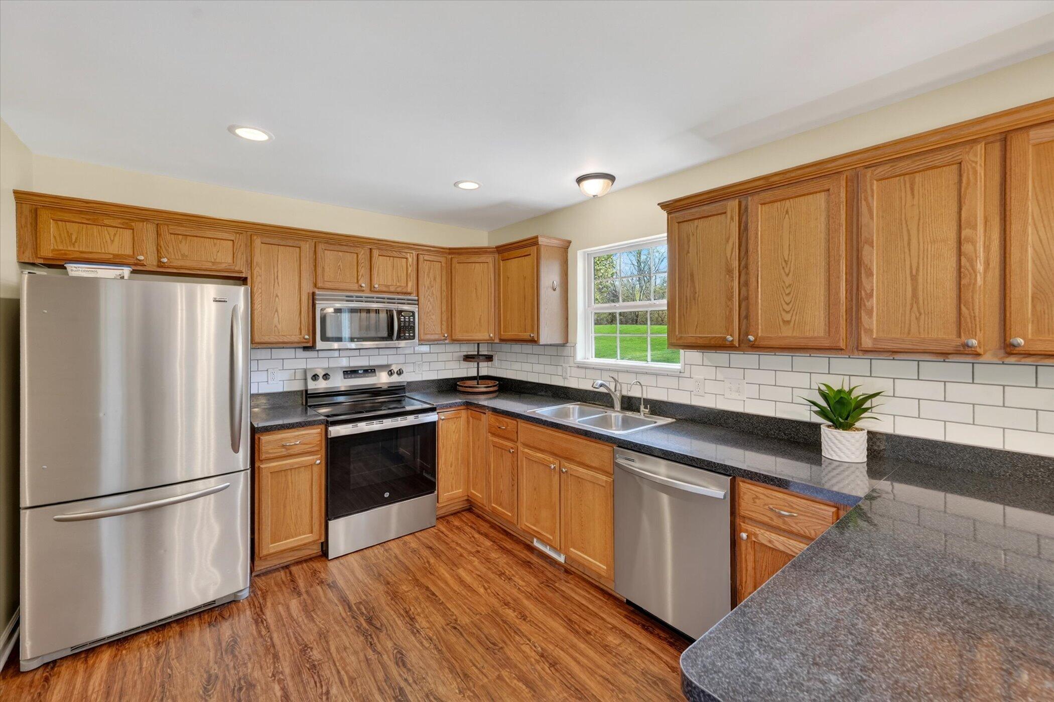 86 Fox Meadows Court Howell, MI 48843 - Photo 7 of 37 08-86-Fox-Meadows-Ct-WindowStill-Real-Es