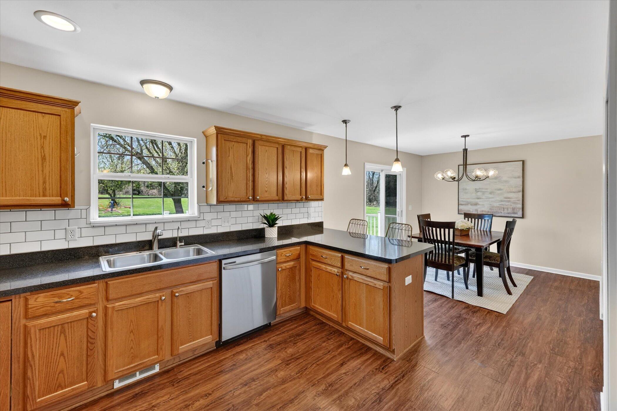 86 Fox Meadows Court Howell, MI 48843 - Photo 8 of 37 09-86-Fox-Meadows-Ct-WindowStill-Real-Es