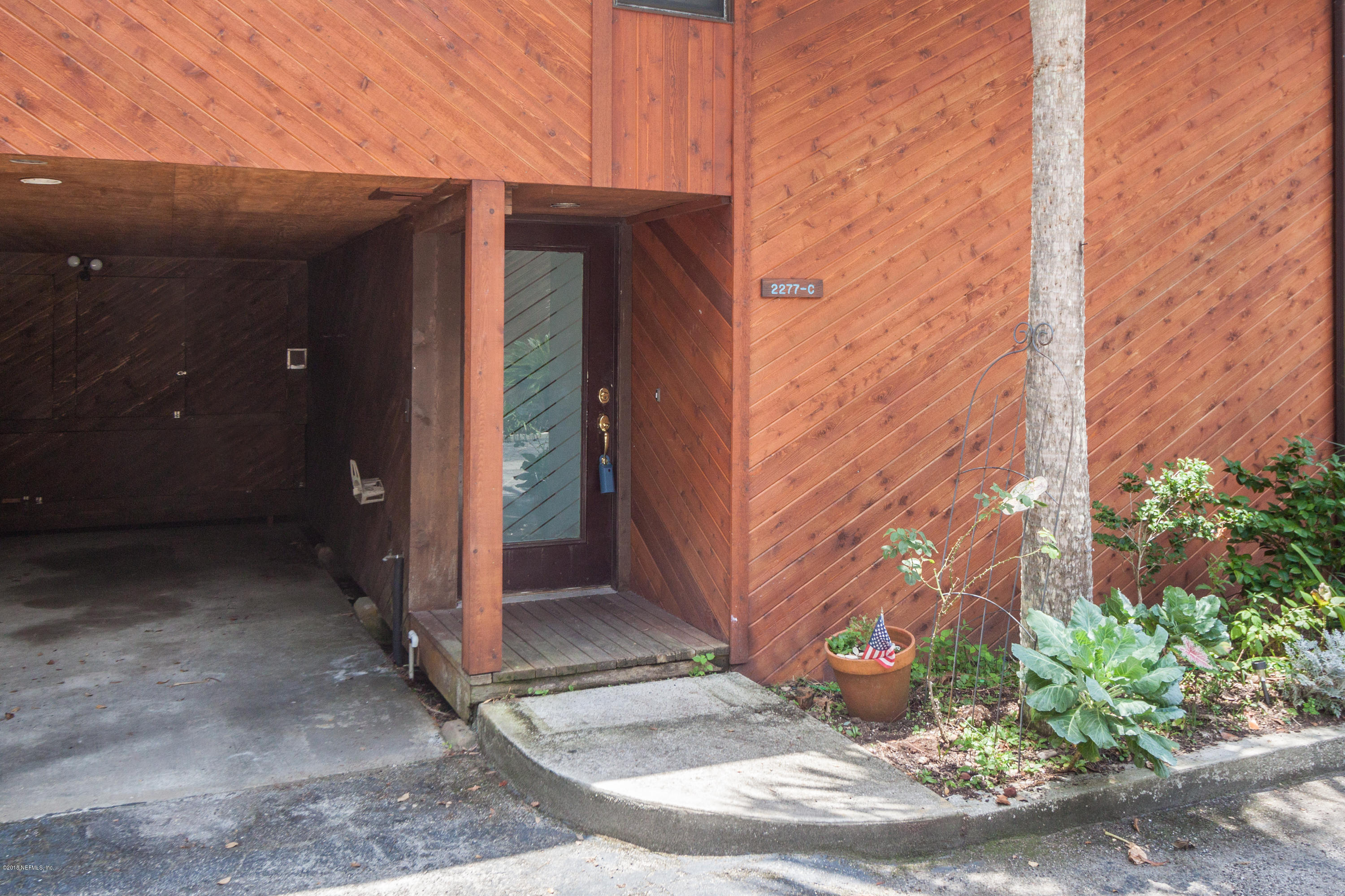 2277 Seminole Road, Unit C Atlantic Beach, FL 32233 - Photo 2 of 27 front entry & carport