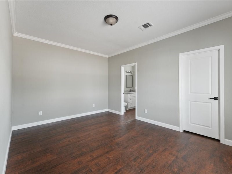 21500 Ruth Drive New Caney, TX 77357 - Photo 6 of 9 a view of an empty room with closet and a window