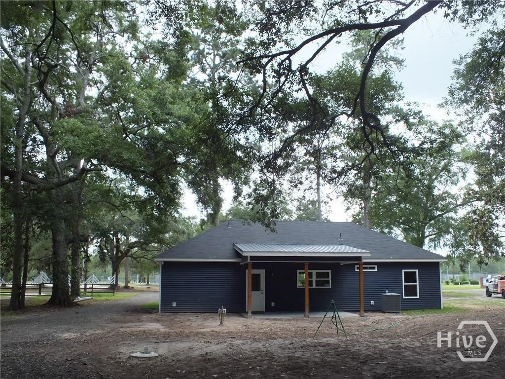 309 Honey Ridge Road Guyton, GA 31312 - Photo 2 of 14 Covered Back Porch