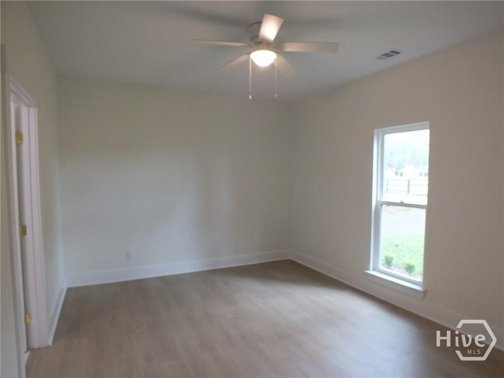 309 Honey Ridge Road Guyton, GA 31312 - Photo 5 of 14 Master Suite with walk in closet