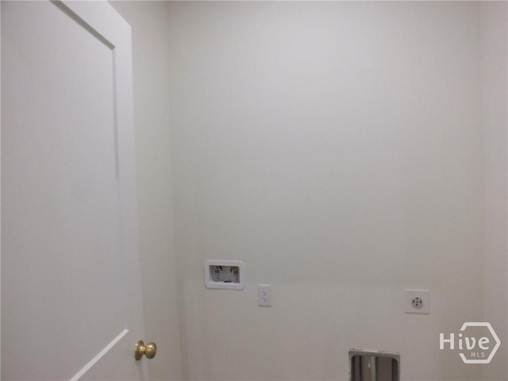 309 Honey Ridge Road Guyton, GA 31312 - Photo 9 of 14 Laundry Room