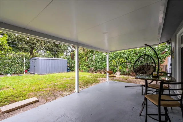 a view of a room with garden and patio