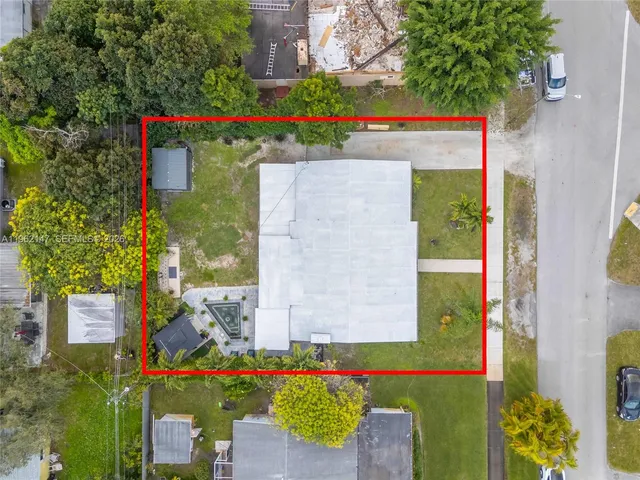 an outdoor space with potted plants