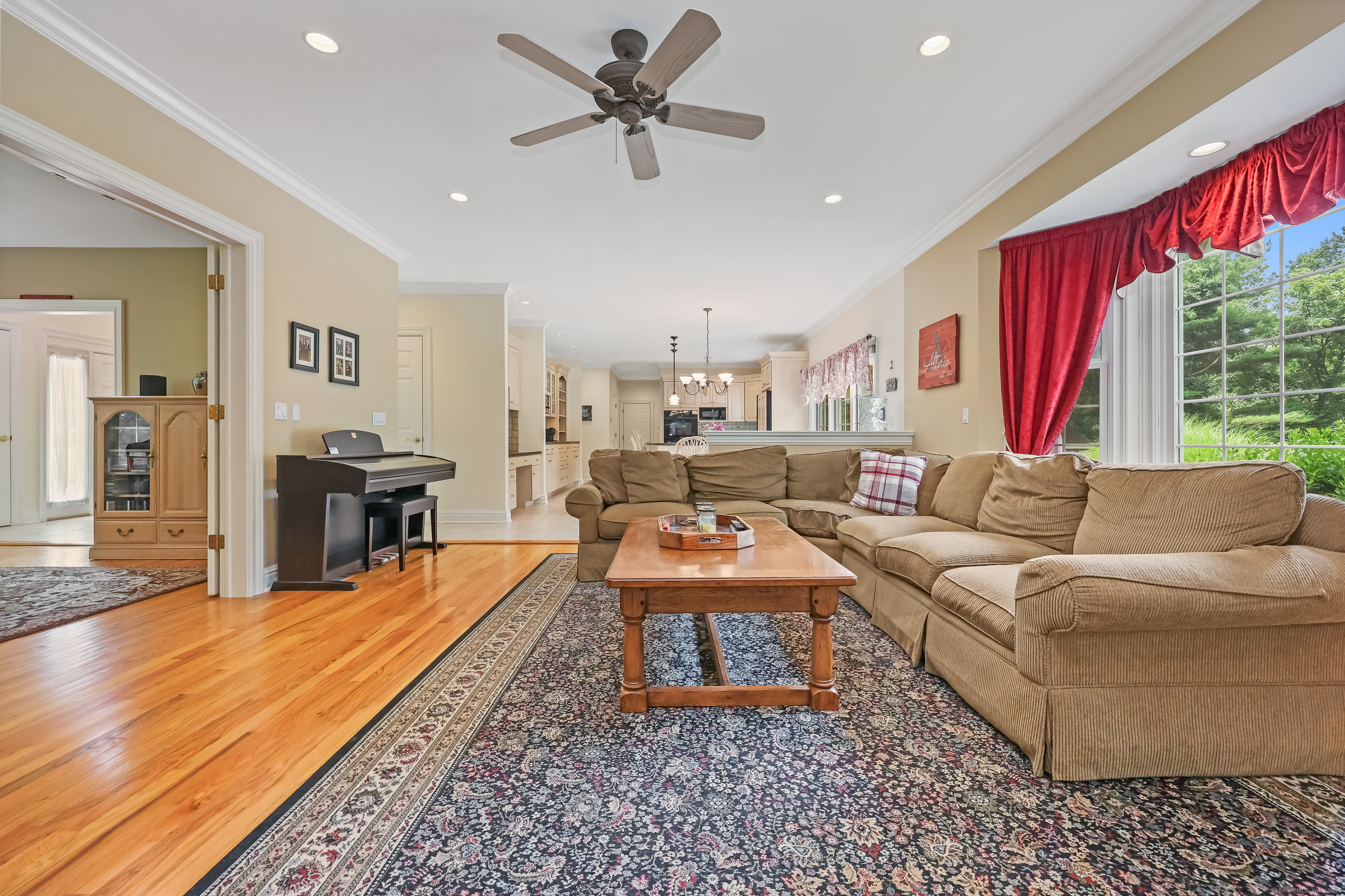 28 Sunnyview Drive Redding, CT 06896 - Photo 14 of 38 a living room with furniture and a large window