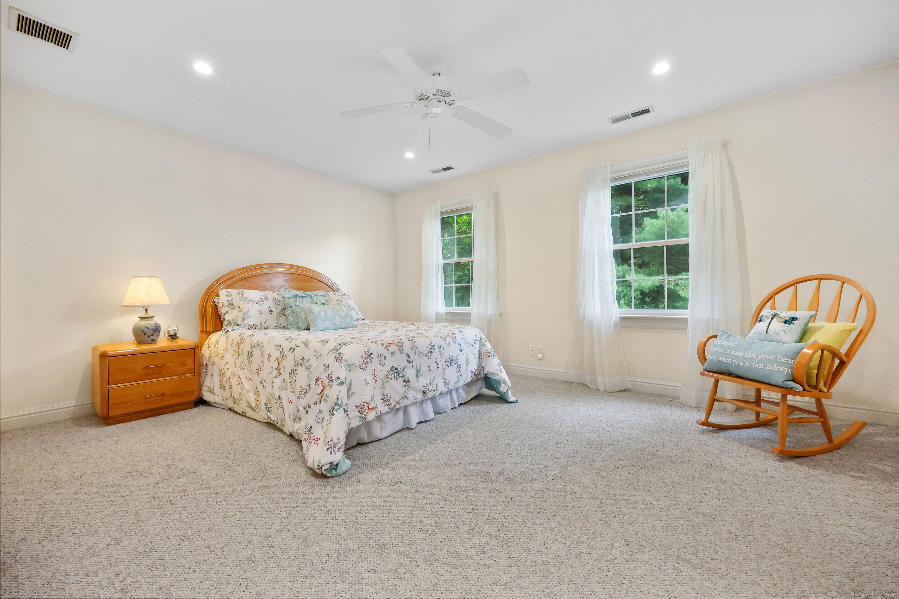28 Sunnyview Drive Redding, CT 06896 - Photo 19 of 38 a bedroom with furniture and a window