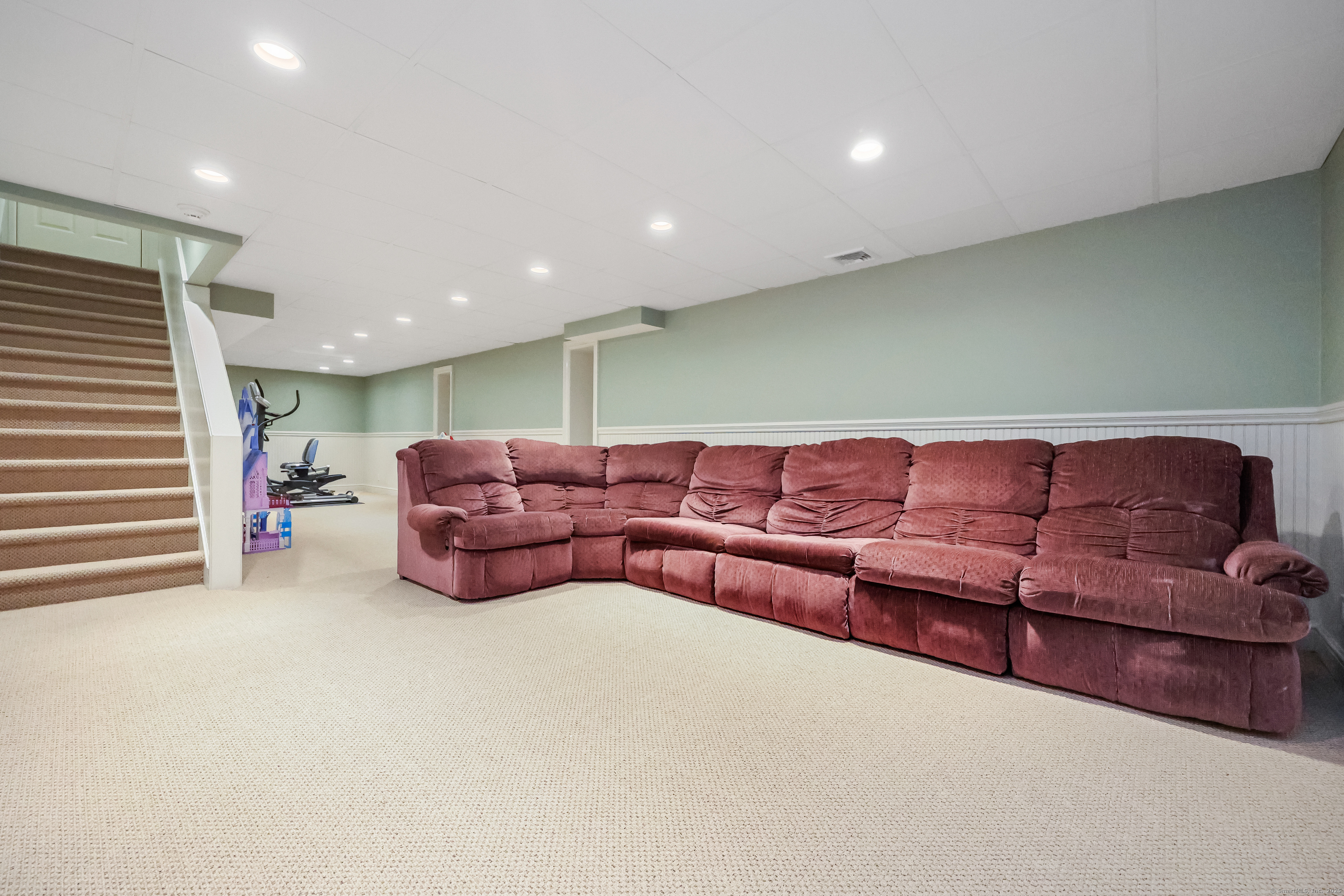 28 Sunnyview Drive Redding, CT 06896 - Photo 28 of 38 a living room with couches and kitchen view