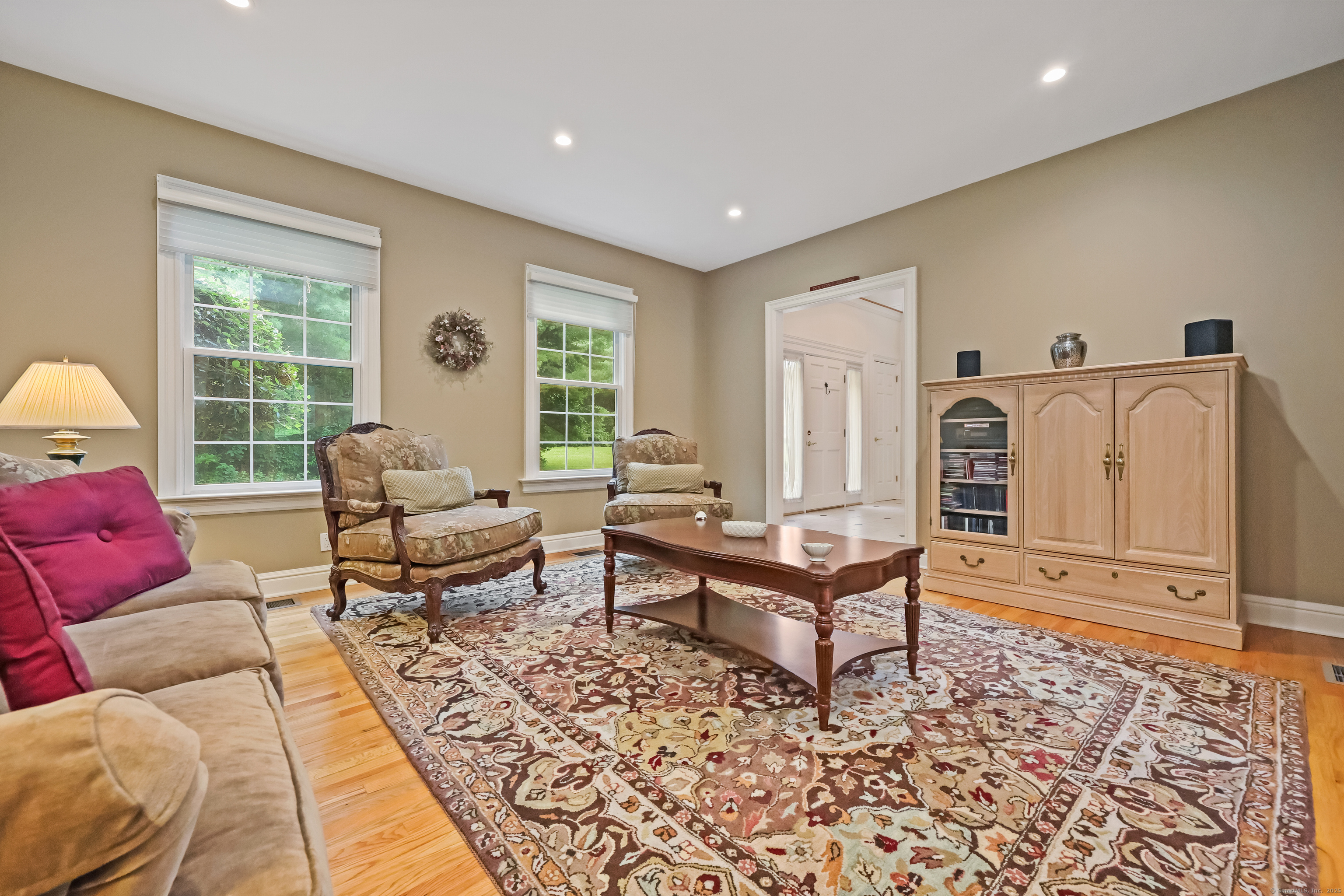 28 Sunnyview Drive Redding, CT 06896 - Photo 5 of 38 a living room with furniture and a rug