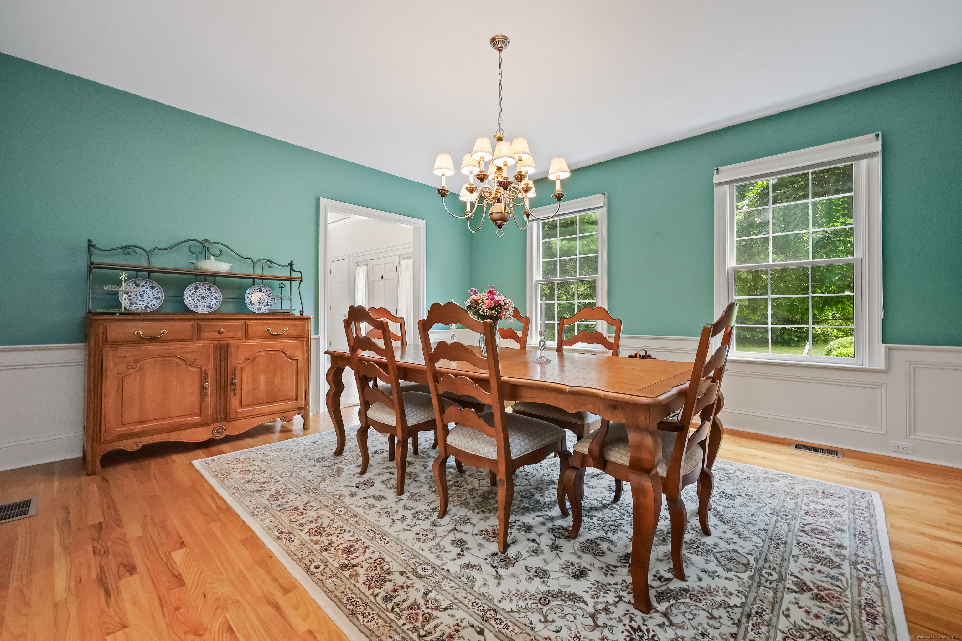 28 Sunnyview Drive Redding, CT 06896 - Photo 6 of 38 a view of a dining room with furniture window and wooden floor